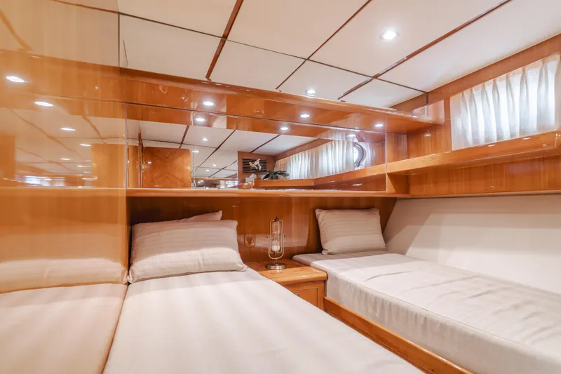 Slide: The Image of Luxurious 2008 Ocean Alexander Pilothouse cabin with twin beds and elegant wood finish. - 36