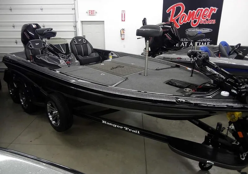 The Image of 2025 Ranger Z520R Ranger Cup Equipped boat in showroom, black exterior, advanced fishing features. - 1