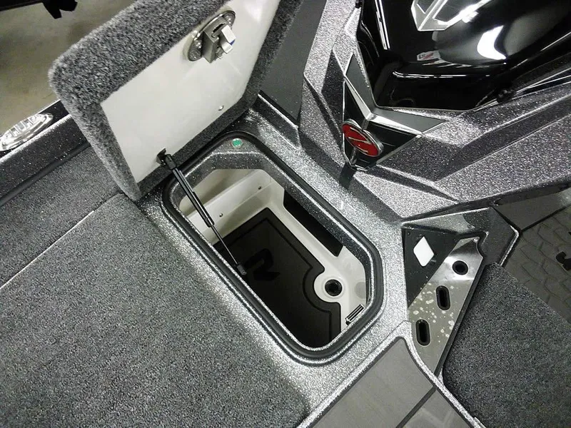 Slide: The Image of 2025 Ranger Z520R Ranger Cup Equipped boat storage compartment, open lid, sleek design. - 18