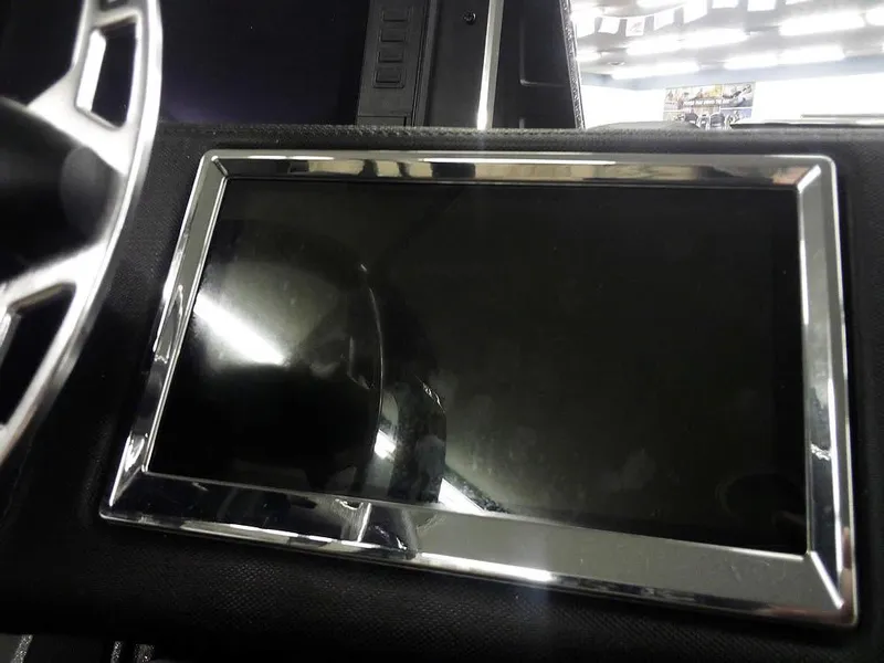 Slide: The Image of 2025 Ranger Z520R Ranger Cup Equipped dashboard display with chrome trim. - 32