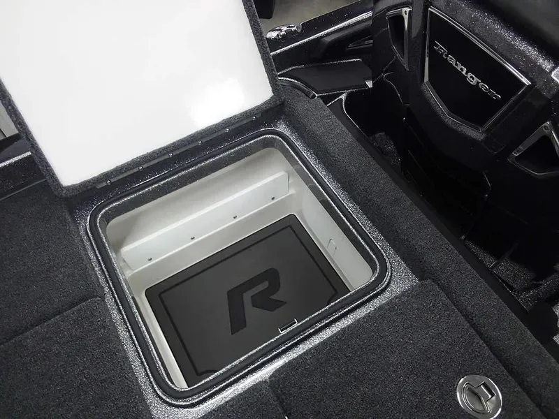 Slide: The Image of 2025 Ranger Z520R Ranger Cup Equipped storage compartment with open lid, showcasing interior design. - 35