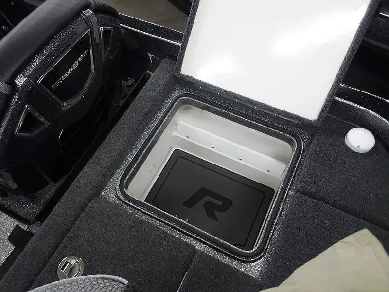 Slide: The Image of 2025 Ranger Z520R Ranger Cup Equipped boat storage compartment, open lid, interior view. - 36