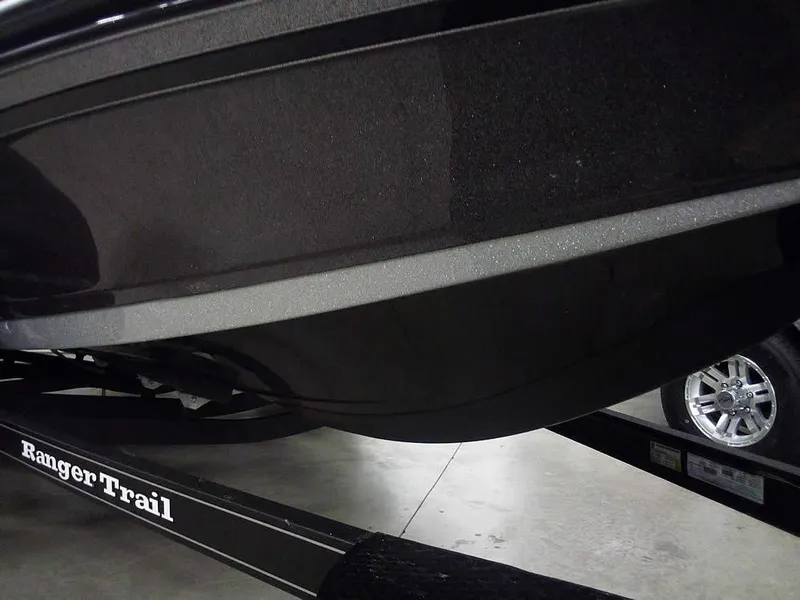 Slide: The Image of 2025 Ranger Z520R boat on Ranger Trail trailer, close-up view. - 4
