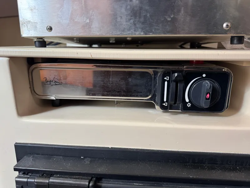 Slide: The Image of Control panel of a 2005 Albin 28 Tournament Express boat. - 23