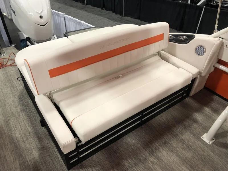 Slide: The Image of 2024 Bennington LX Sport Swingback 26 LXSSBA boat seat with white and orange upholstery. - 6