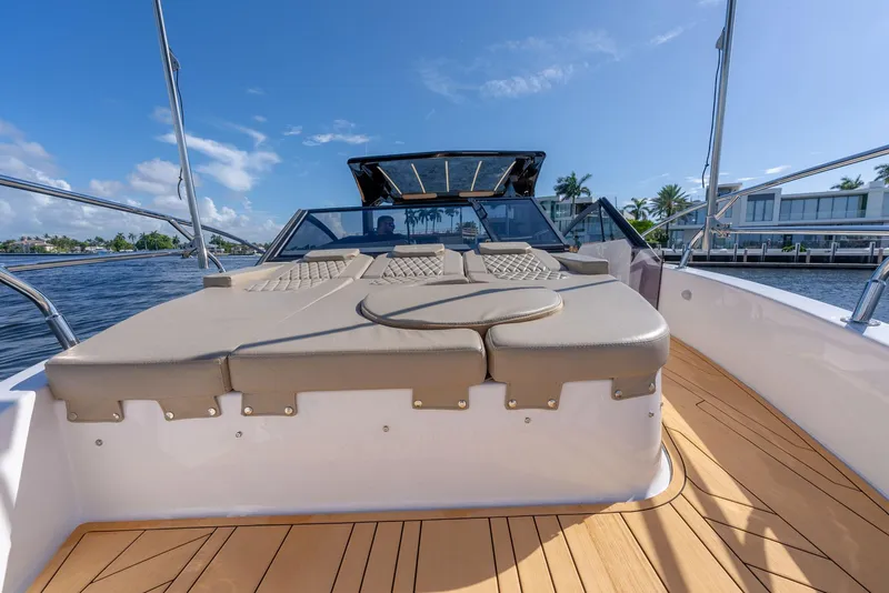 Slide: The Image of 2024 Hanover 347 boat with sun deck, wooden flooring, and waterfront view. - 36