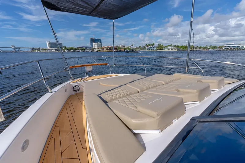 Slide: The Image of 2024 Hanover 347 yacht with sunbathing deck on a scenic waterfront. - 37