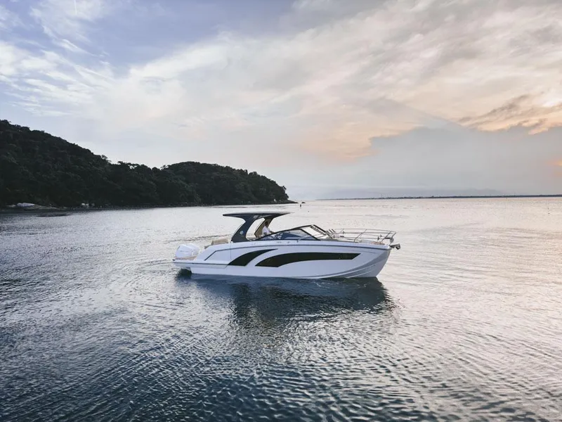 Slide: The Image of 2024 Hanover 347 boat on calm water at sunset. - 4