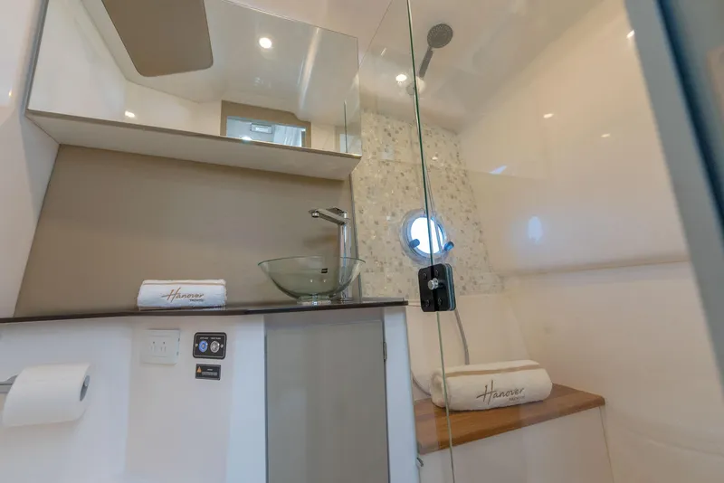 Slide: The Image of Luxurious bathroom in 2024 Hanover 347 yacht with modern glass sink and shower. - 42