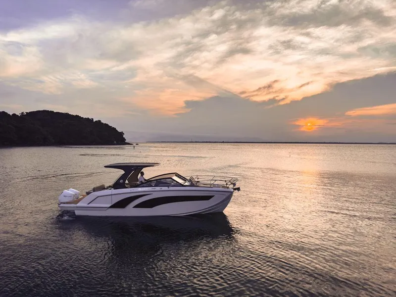 Slide: The Image of 2024 Hanover 347 boat cruising at sunset on calm waters. - 5