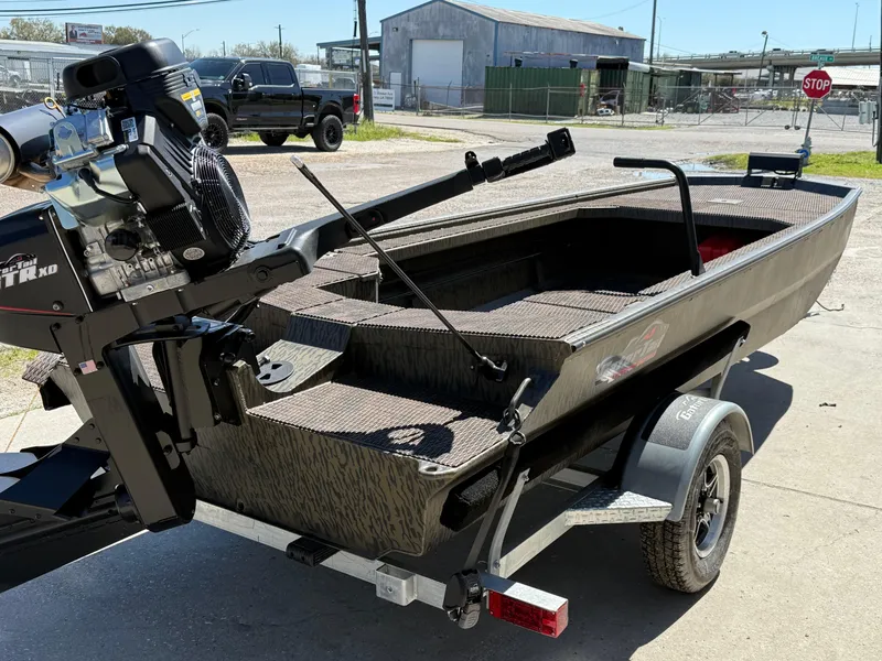 Slide: The Image of 2025 Gator Tail 1854 Extreme boat on trailer, featuring powerful motor and rugged design. - 4
