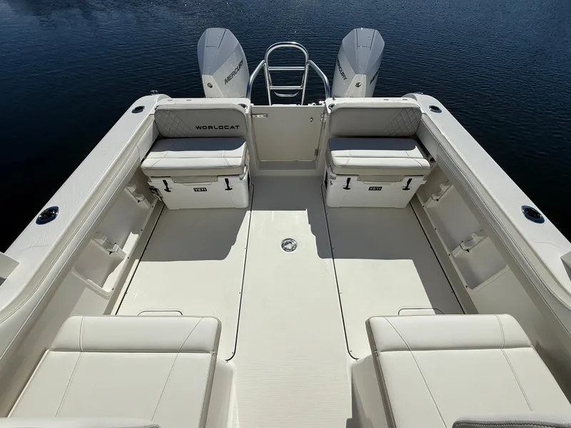 Slide: The Image of 2025 World Cat 296 DC boat interior with spacious seating and twin engines. - 8