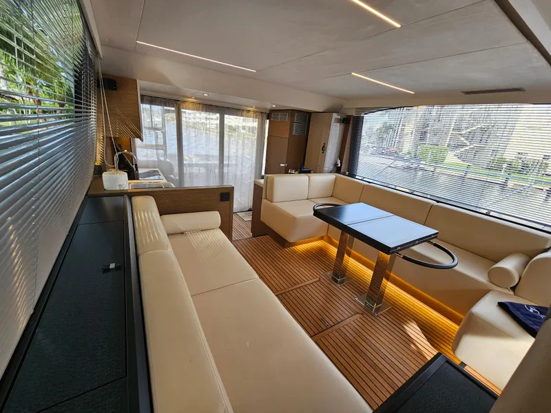 Slide: The Image of Luxurious interior of 2021 Beneteau Monte Carlo 52 yacht with elegant seating and modern design. - 14