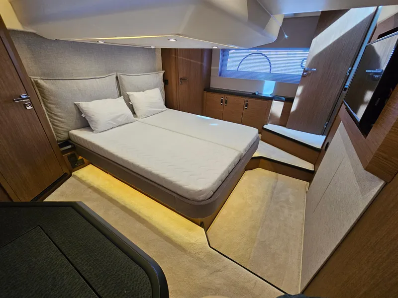 Slide: The Image of Luxurious bedroom interior of 2021 Beneteau Monte Carlo 52 yacht with modern design. - 18
