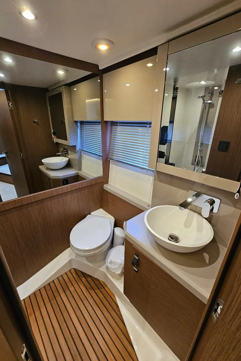 Slide: The Image of Luxurious bathroom in 2021 Beneteau Monte Carlo 52 yacht with modern fixtures. - 19