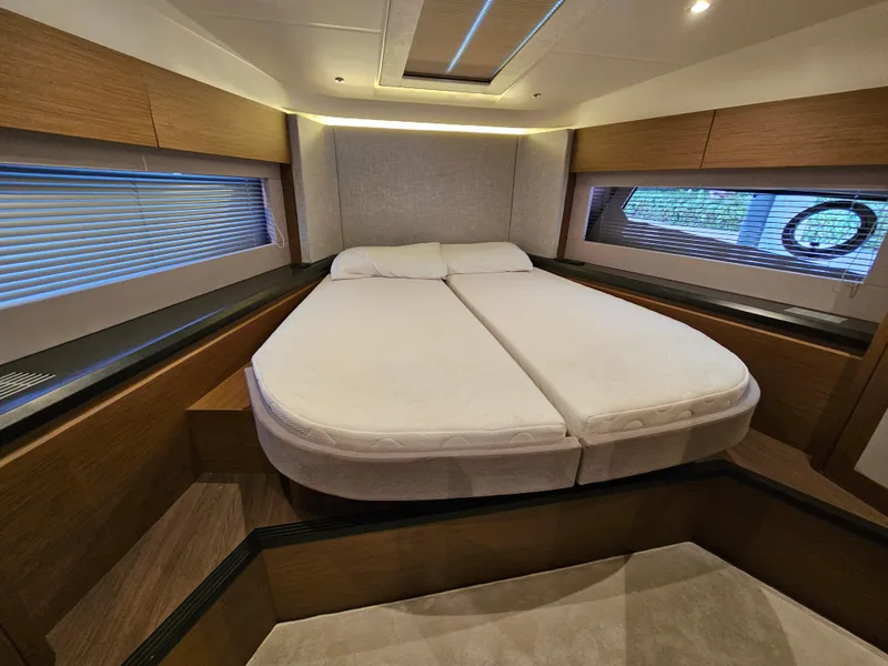 Slide: The Image of Luxurious bedroom interior of 2021 Beneteau Monte Carlo 52 yacht with modern design. - 20