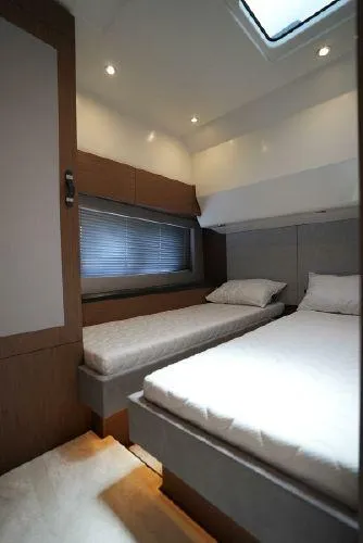 Slide: The Image of Interior cabin of 2021 Beneteau Monte Carlo 52 yacht with twin beds. - 24
