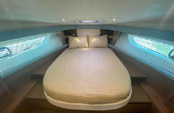 Slide: The Image of 2019 Beneteau Gran Turismo 40 cabin with cozy bed and modern interior design. - 30