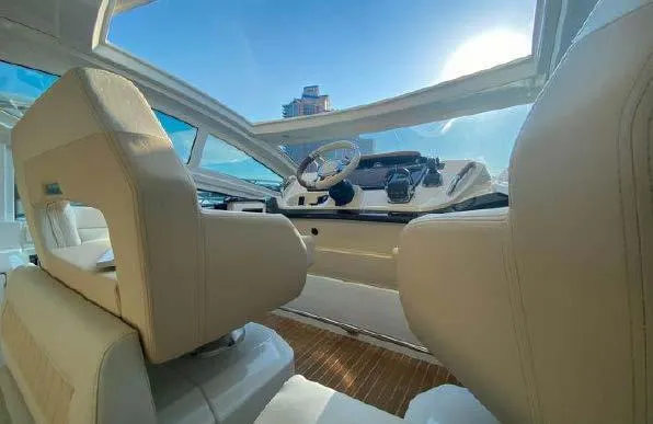 Slide: The Image of Interior view of 2019 Beneteau Gran Turismo 40 yacht cockpit with steering wheel. - 36