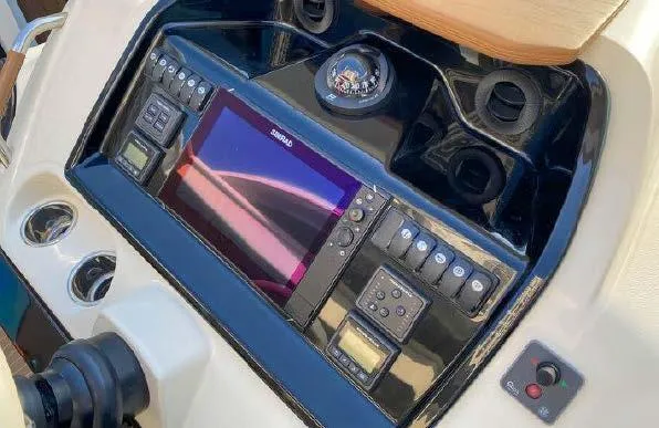 Slide: The Image of Control panel of 2019 Beneteau Gran Turismo 40 yacht with navigation equipment. - 40