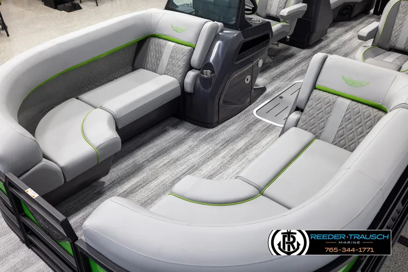 Slide: The Image of 2025 Bennington MFBSE boat interior with gray and green seating, modern design, and spacious layout. - 10