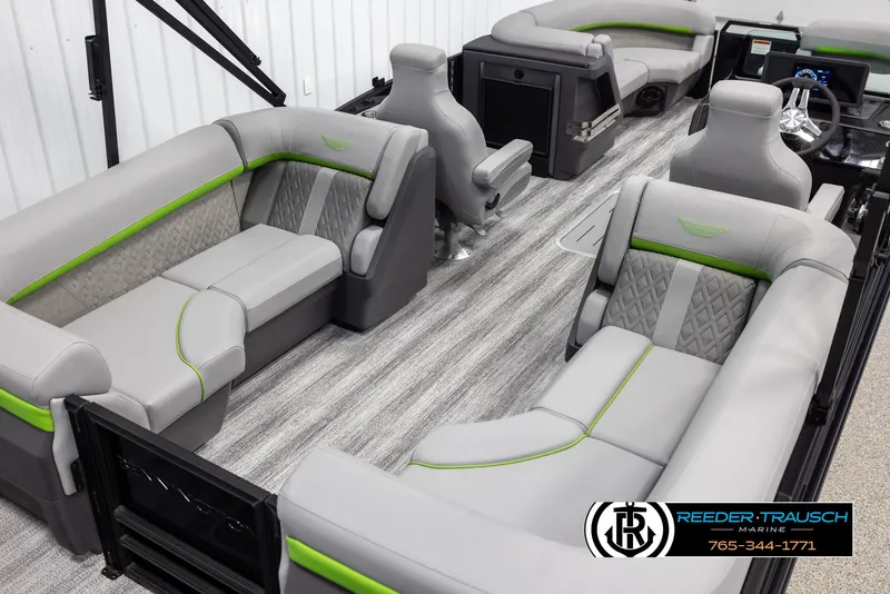Slide: The Image of Interior of 2025 Bennington MFBSE pontoon boat with gray and green seating. - 12