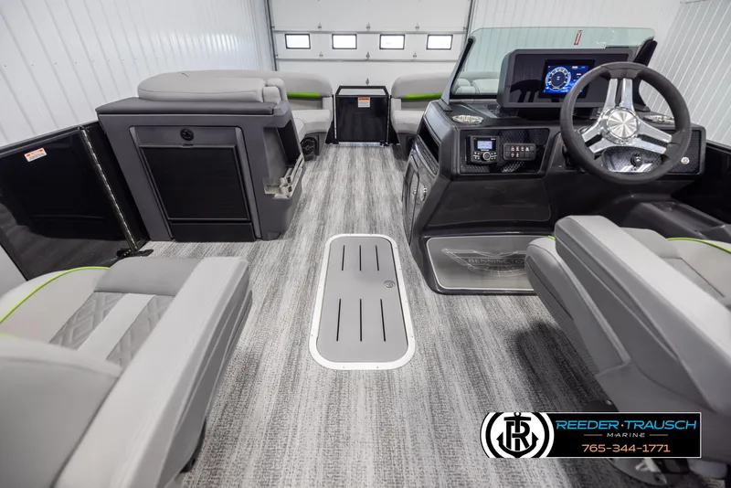 Slide: The Image of 2025 Bennington MFBSE boat interior with modern dashboard and seating. - 17