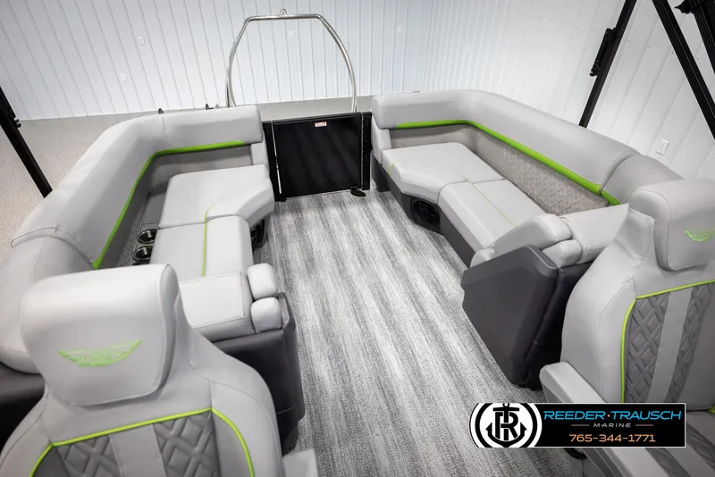 Slide: The Image of 2025 Bennington MFBSE boat interior with gray and green seating, modern design. - 25