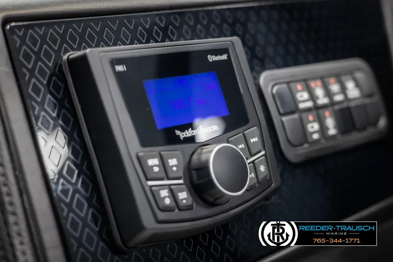 Slide: The Image of Bennington MFBSE 2025 dashboard with Rockford Fosgate Bluetooth audio system. - 30