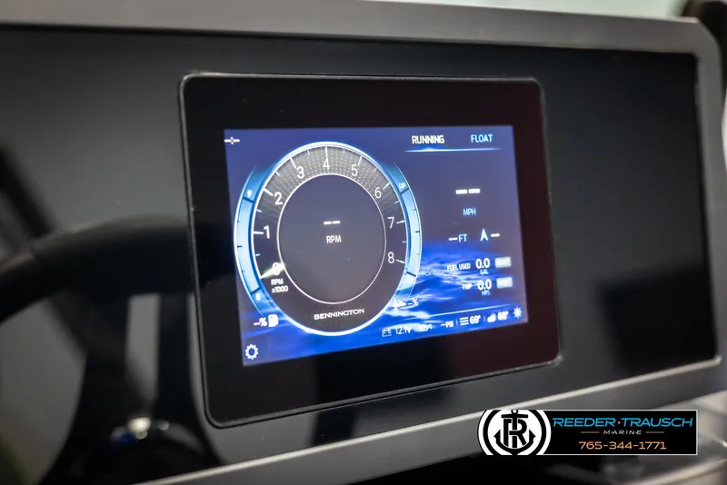 Slide: The Image of 2025 Bennington MFBSE dashboard display showing RPM and speedometer. - 32