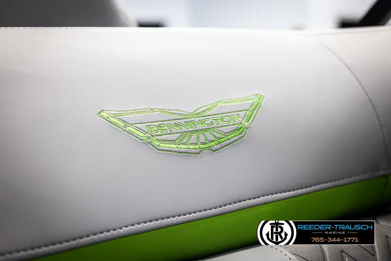Slide: The Image of 2025 Bennington MFBSE boat seat with green embroidered logo. - 37