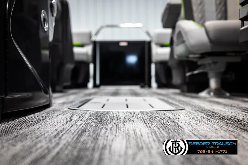 Slide: The Image of 2025 Bennington MFBSE interior with modern seating and carpet flooring. - 43