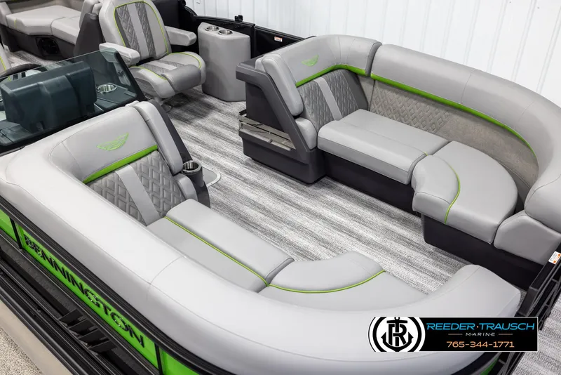 Slide: The Image of 2025 Bennington MFBSE boat interior with gray and green seating, featuring modern design and comfort. - 9