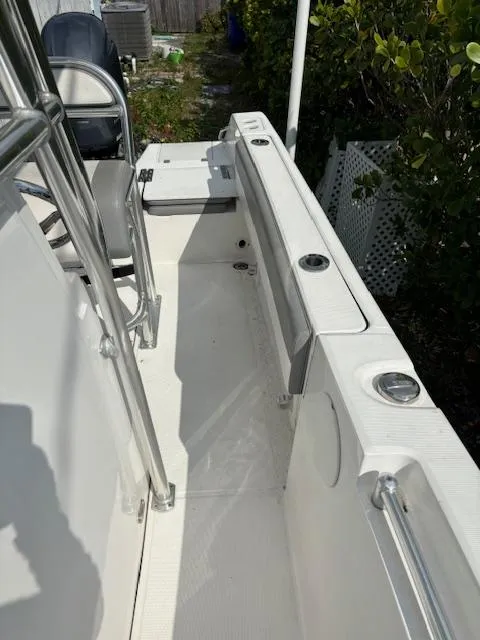 Slide: The Image of 2016 Release 208 RX boat interior with seating and rod holders. - 17