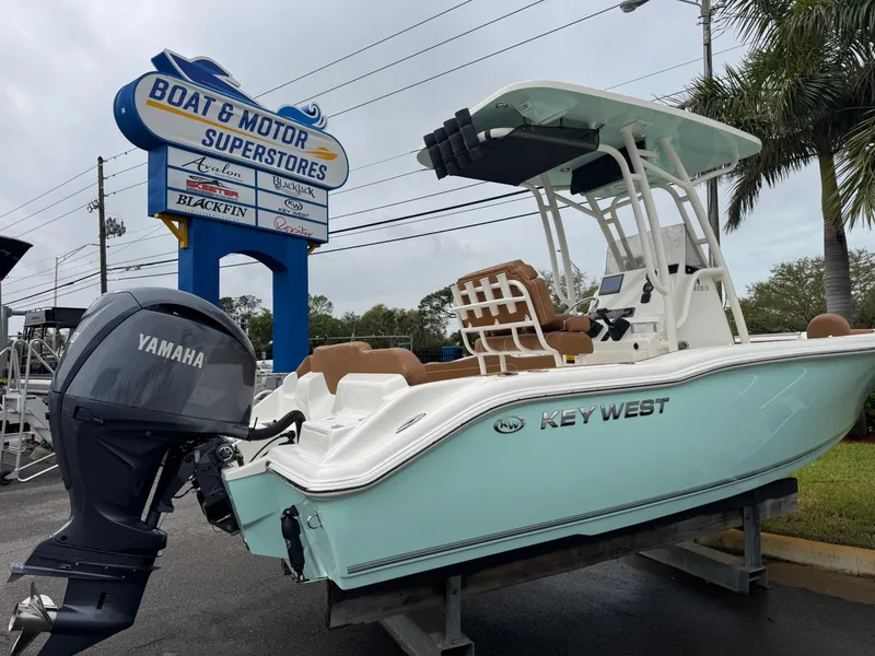Slide: The Image of 2025 Key West 219 FS boat displayed at Boat & Motor Superstores with Yamaha engine. - 7