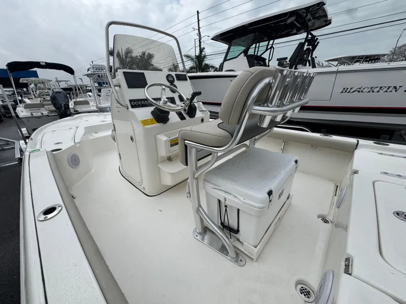 Slide: The Image of 2025 Key West 210 Bay Reef boat interior with console and seating. - 10