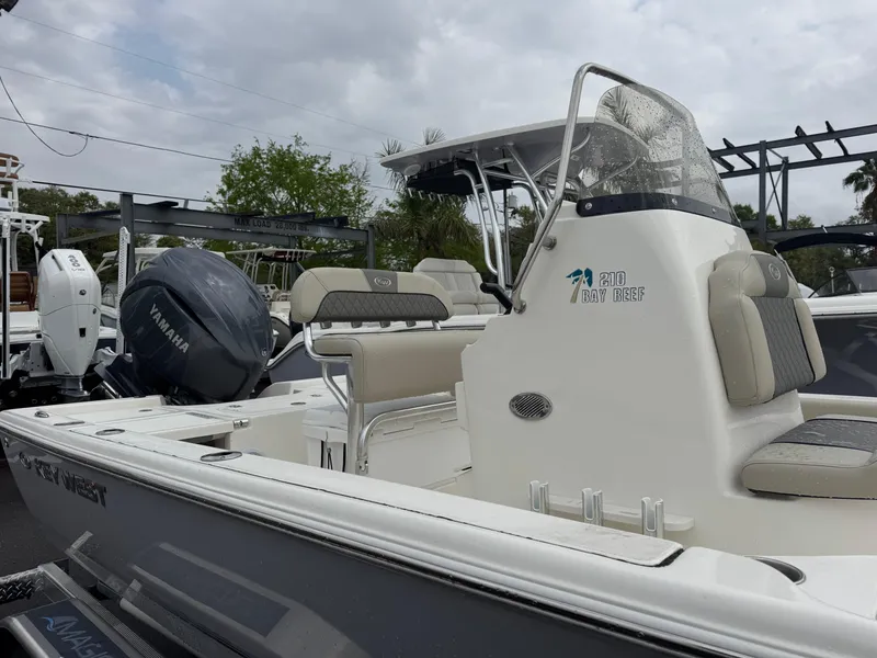 Slide: The Image of 2025 Key West 210 Bay Reef boat with Yamaha engine, featuring sleek design and comfortable seating. - 3
