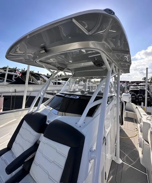 Slide: The Image of 2019 Nor-Tech 340 Sport Center Console boat with sleek design and modern features. - 8