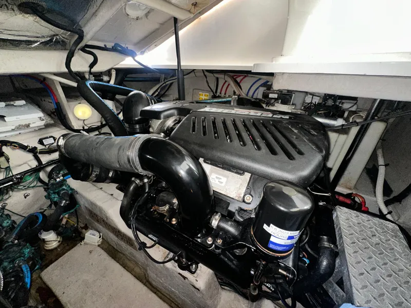 Slide: The Image of Engine compartment of a 2007 Sea Ray 380 Sundancer boat. - 39