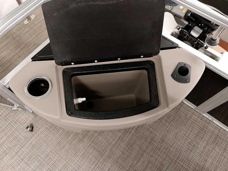 Slide: The Image of 2023 Ranger Reata 200F Pontoon boat interior with open storage compartment. - 11