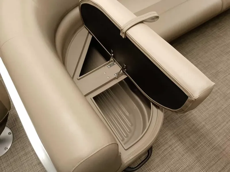 Slide: The Image of 2023 Ranger Reata 200F Pontoon storage compartment with beige seating. - 14