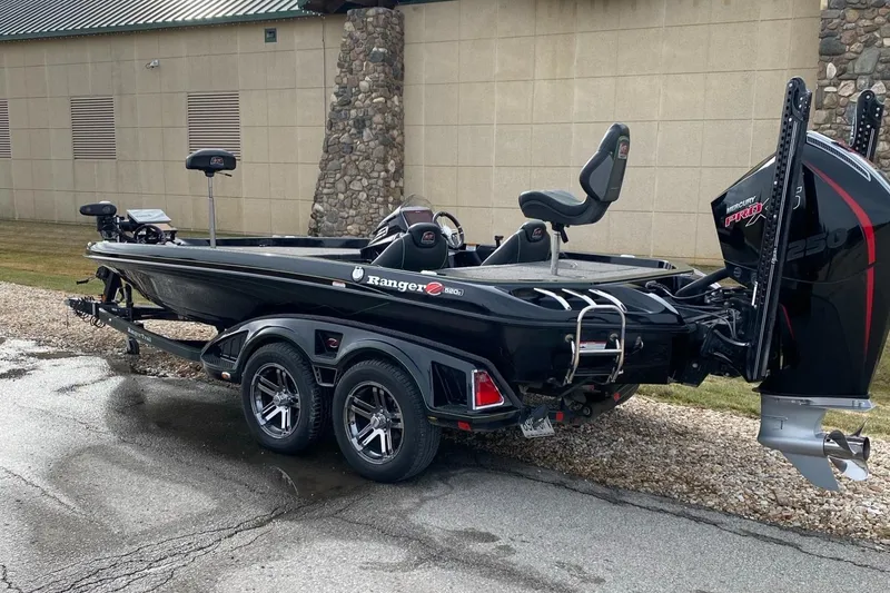 Slide: The Image of 2020 Ranger Z520C Ranger Cup Equipped boat on trailer, parked outdoors. - 3