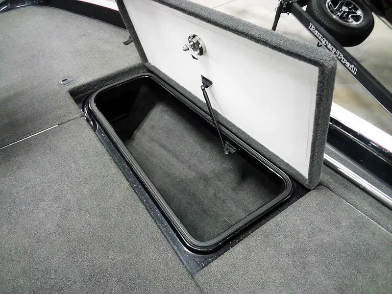 Slide: The Image of Open storage compartment in 2013 Ranger Z520C Comanche boat. - 18