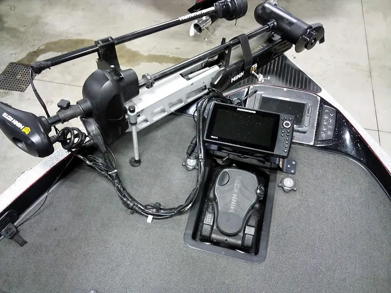 Slide: The Image of 2013 Ranger Z520C Comanche boat deck with trolling motor and fish finder. - 21