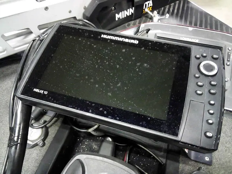 Slide: The Image of Humminbird Helix 10 fish finder on 2013 Ranger Z520C Comanche boat dashboard. - 24