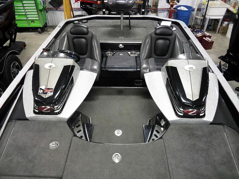 Slide: The Image of 2013 Ranger Z520C Comanche boat interior with dual seats and sleek design. - 27