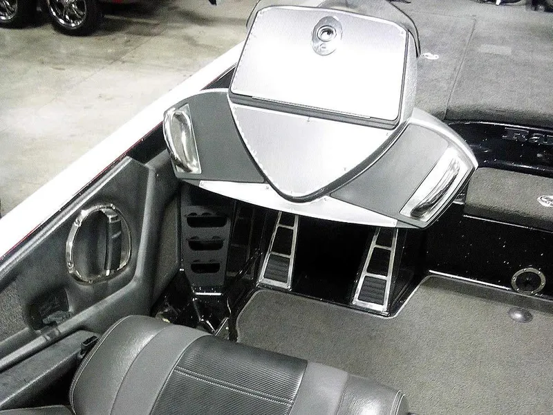 Slide: The Image of 2013 Ranger Z520C Comanche boat interior with sleek dashboard and seating. - 30