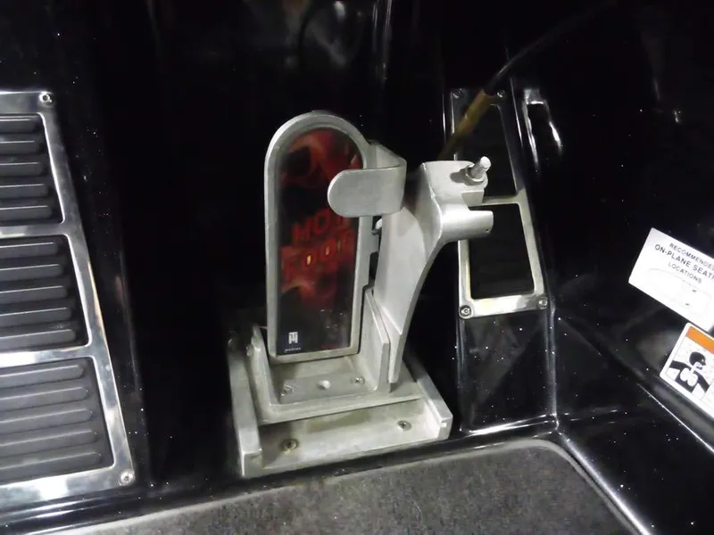 Slide: The Image of 2013 Ranger Z520C Comanche boat throttle control in cockpit area. - 36