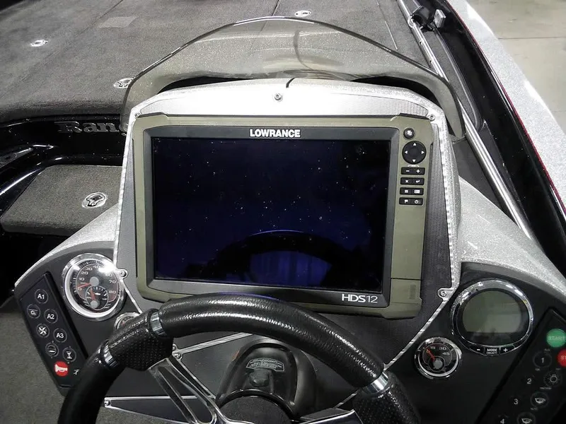 Slide: The Image of Dashboard of a 2013 Ranger Z520C Comanche with Lowrance HDS-12 display. - 38