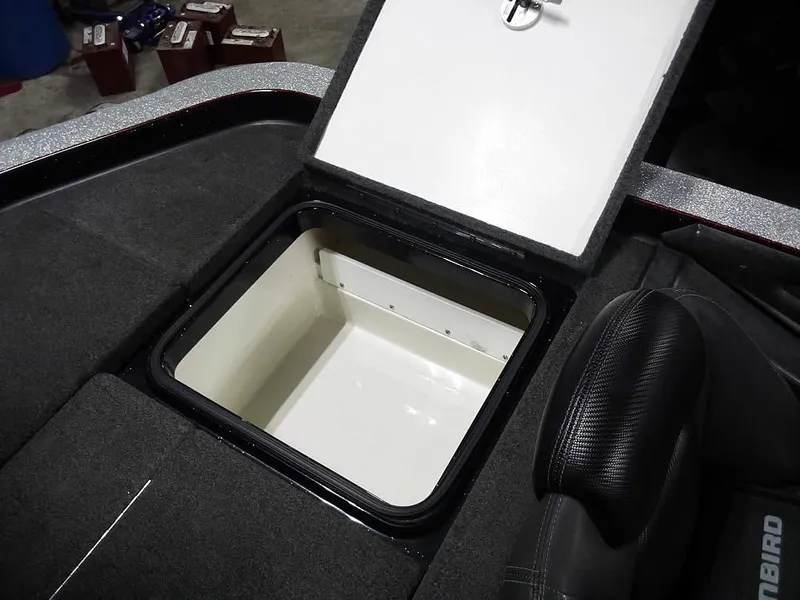 Slide: The Image of 2013 Ranger Z520C Comanche boat storage compartment with open lid, showcasing interior space. - 41